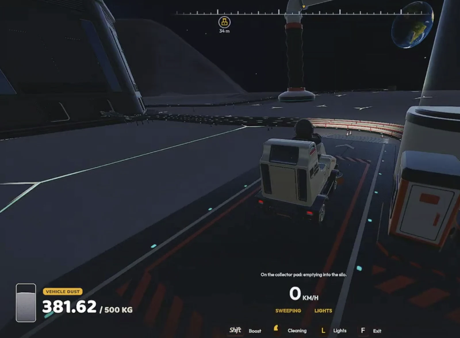 Moon Sweepers vehicle on a garage collector pad with the emptying into silo message visible